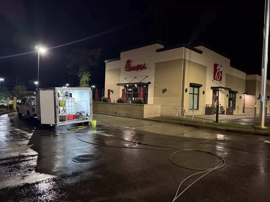 Callahan crew washing a commercial restaurant lot overnight
